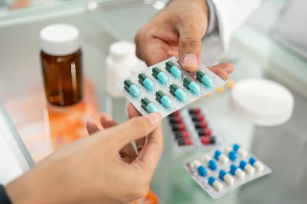 Pharmacist,Recommends,Medicines,To,Customers.,Asking,The,Questions,Of,Medication.