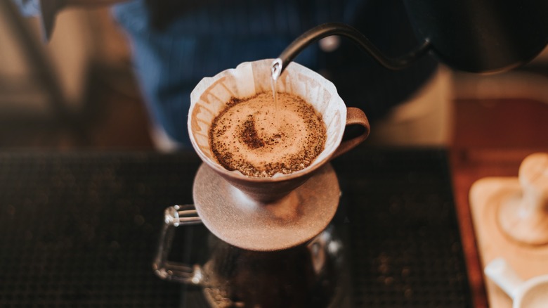 Professional,Barista,Making,Filtered,Drip,Coffee,In,Coffee,Shop.,Close